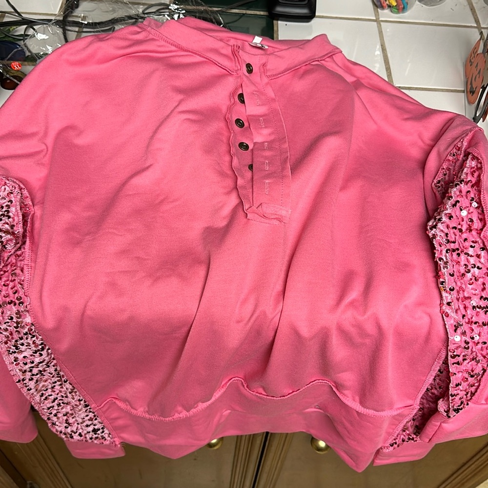 Pink long sleeve top with sequin sleeves and back